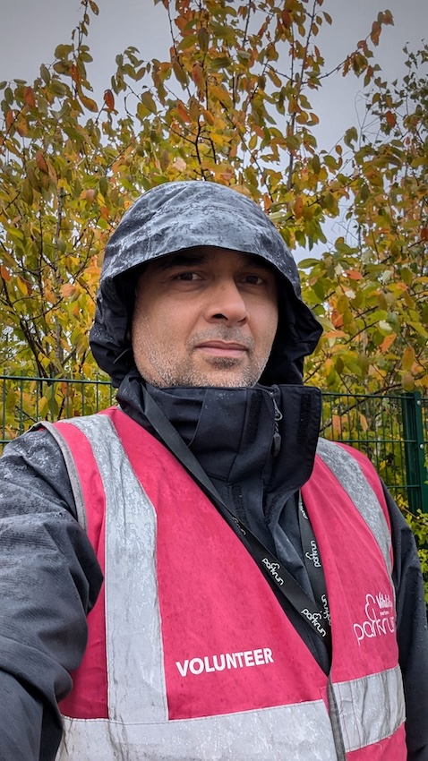 Me in the rain volunteering for Parkrun